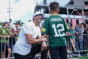 Aaron with boy in jersey